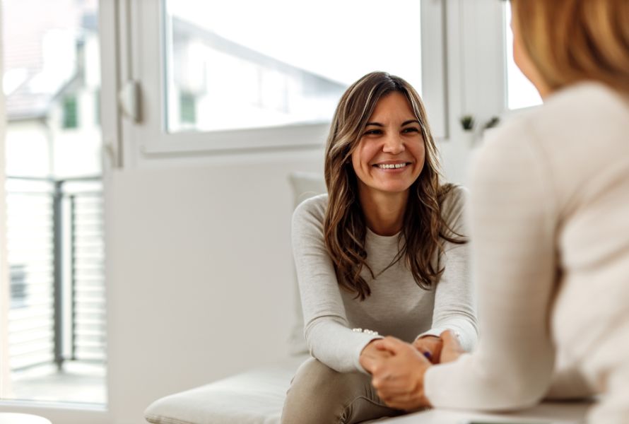 physical therapist talking to patient physical therapist talking to patient