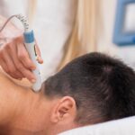 Deep Tissue Laser Therapy Treatment for Pain Relief - Premier Therapy Boca Raton Deep tissue laser therapy treatment being performed for pain relief and muscle recovery