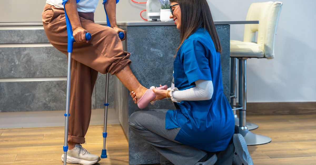 Injury specialist providing hands-on rehabilitation care to help a patient improve mobility and balance